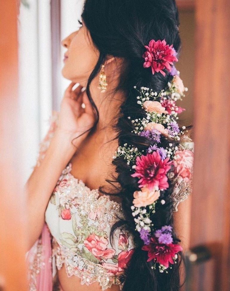 Side-way Flowers Modern Hairstyle for Lehenga