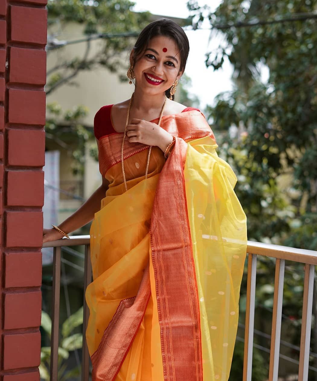 Yellow Bengali Saree Look