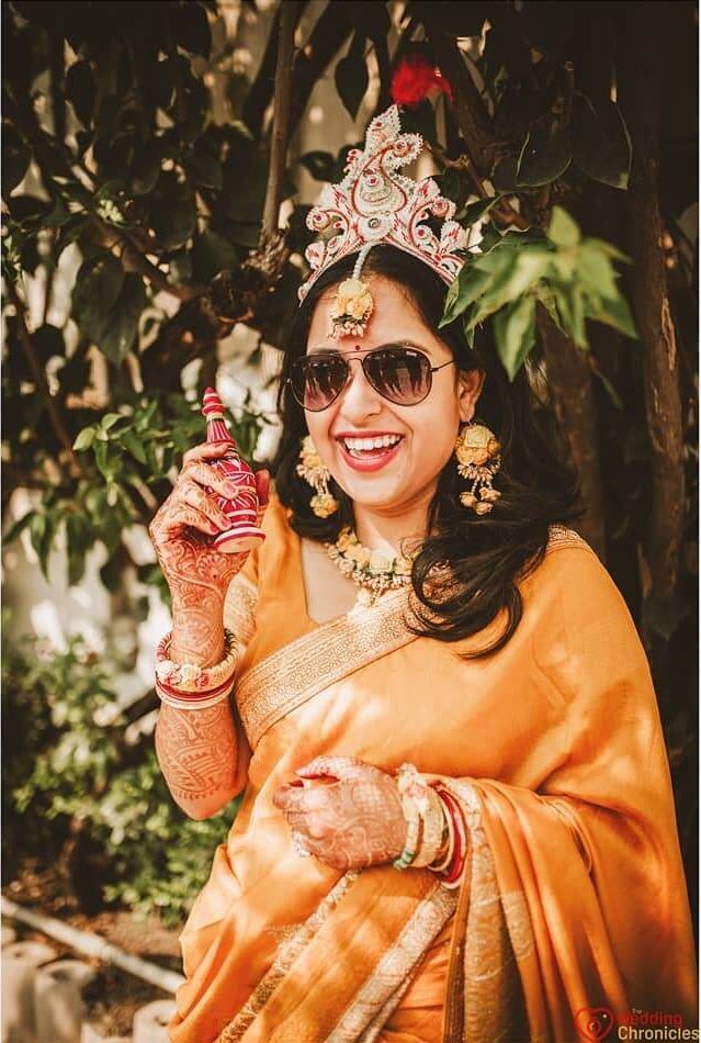 Red Intricacies for Haldi Bengali Bride Mukut Designs