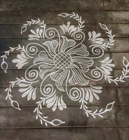 Rangoli Kolam with Lines and Leaves