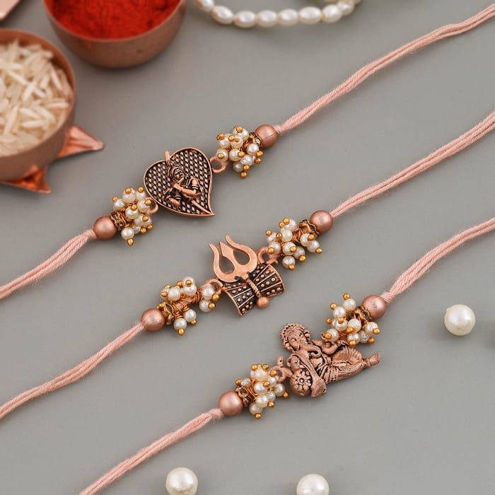 Divine Antique Pearl Rakhi Online
