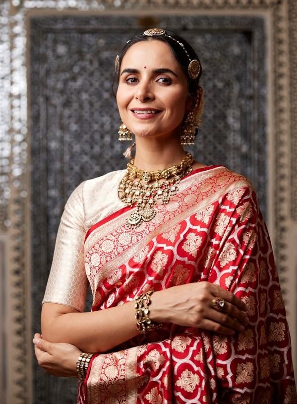 Red Saree with Gold blouse