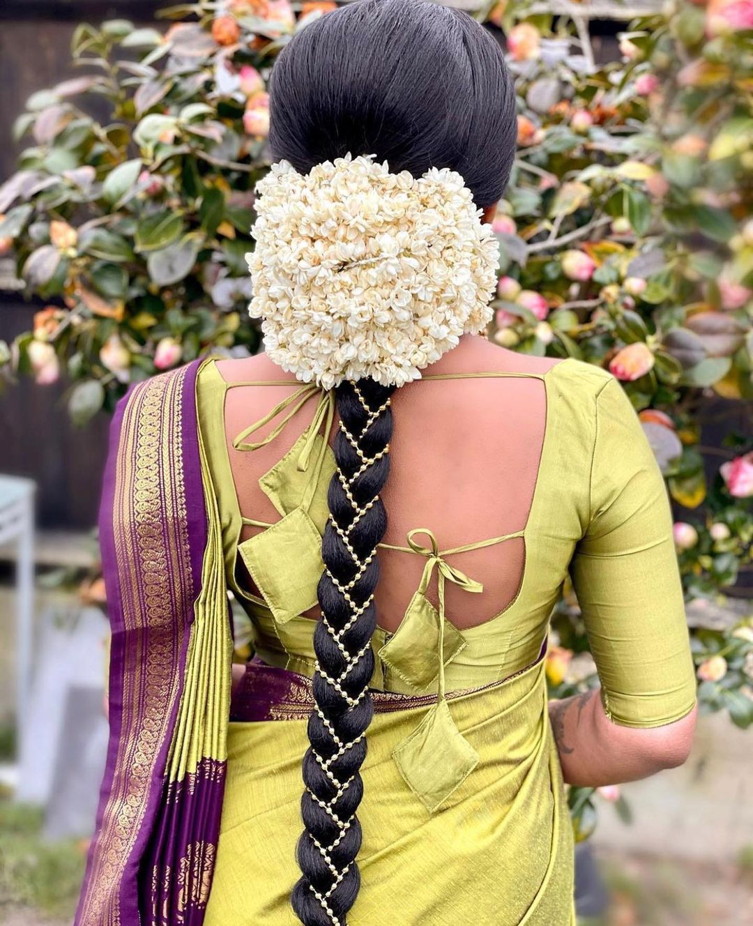 White Flowers Plait Kerala Bridal Hairstyle Backside
