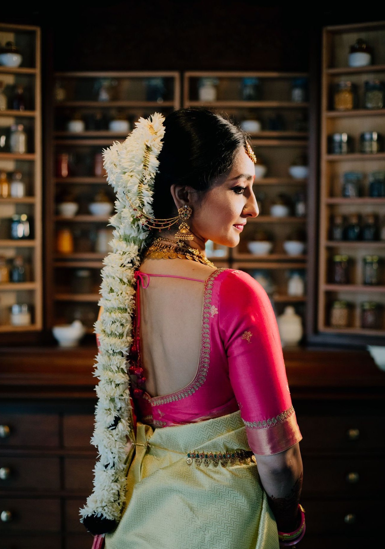 Garland Bun and Plait Kerala Bridal Hairstyle Backside